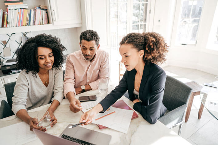 People sharing information in a meeting