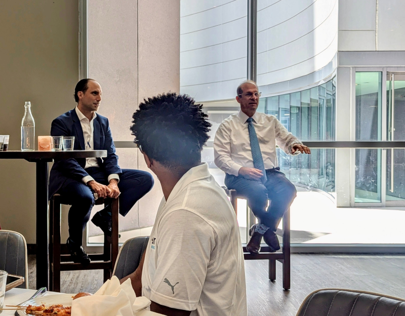 Stellar Bank executives talking with early career professionals.
