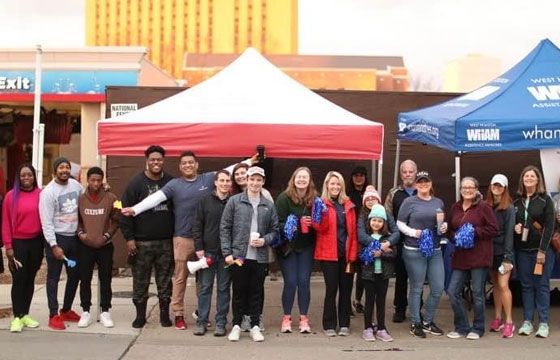 Stellar Bank employees volunteering at the Houston Marathon