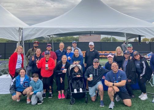 Stellar Bank employees standing with JDRF at a volunteer event