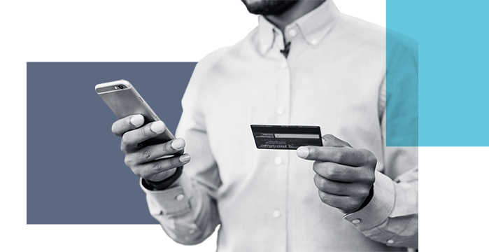 A man entering his business debit card information into his phone