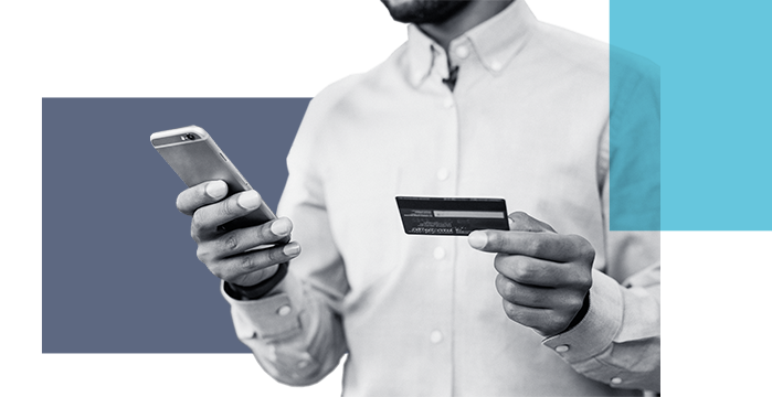 A man entering his business debit card information into his phone