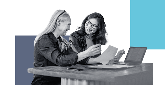 A woman and her mother looking at business loan options through Stellar Bank