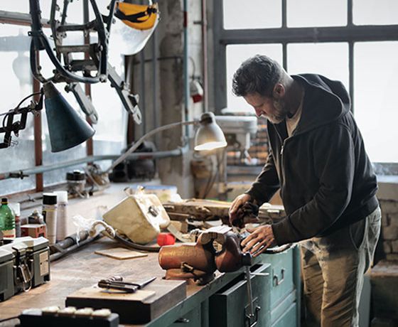 A man working in his woodshop