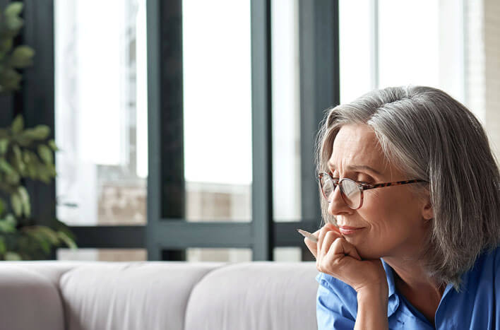 An older woman thinking about retiring