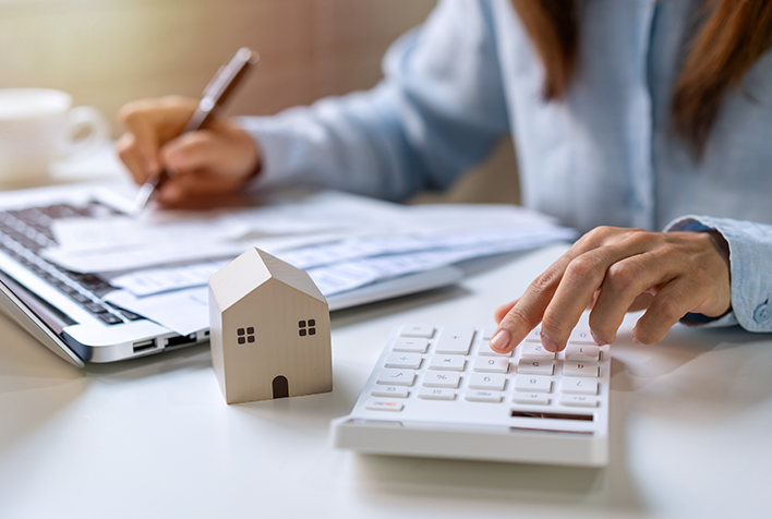 woman calculating home finances